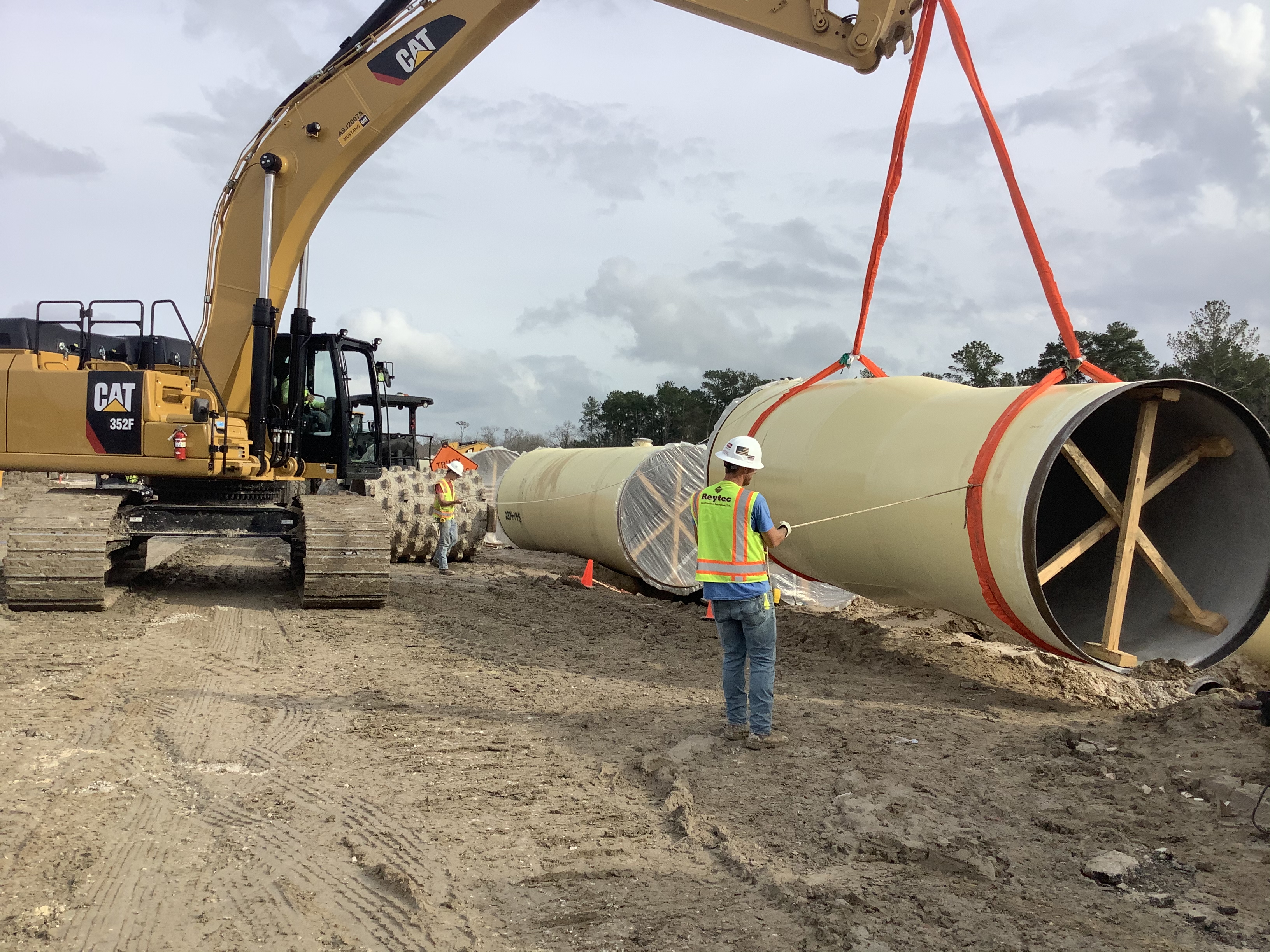 Five Companies' partner firm, Reytec, places the first joint of pipe at the NEWPP (1/16/20).